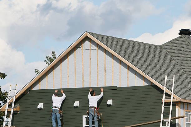 Professional Emergency Siding Repair technician working in Croton, OH